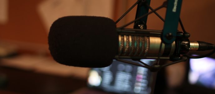black microphone on black microphone stand